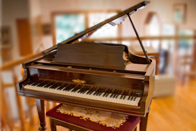 Piano tuner Mark Mention - a Chickering Grand Piano for Sale for $4500.00